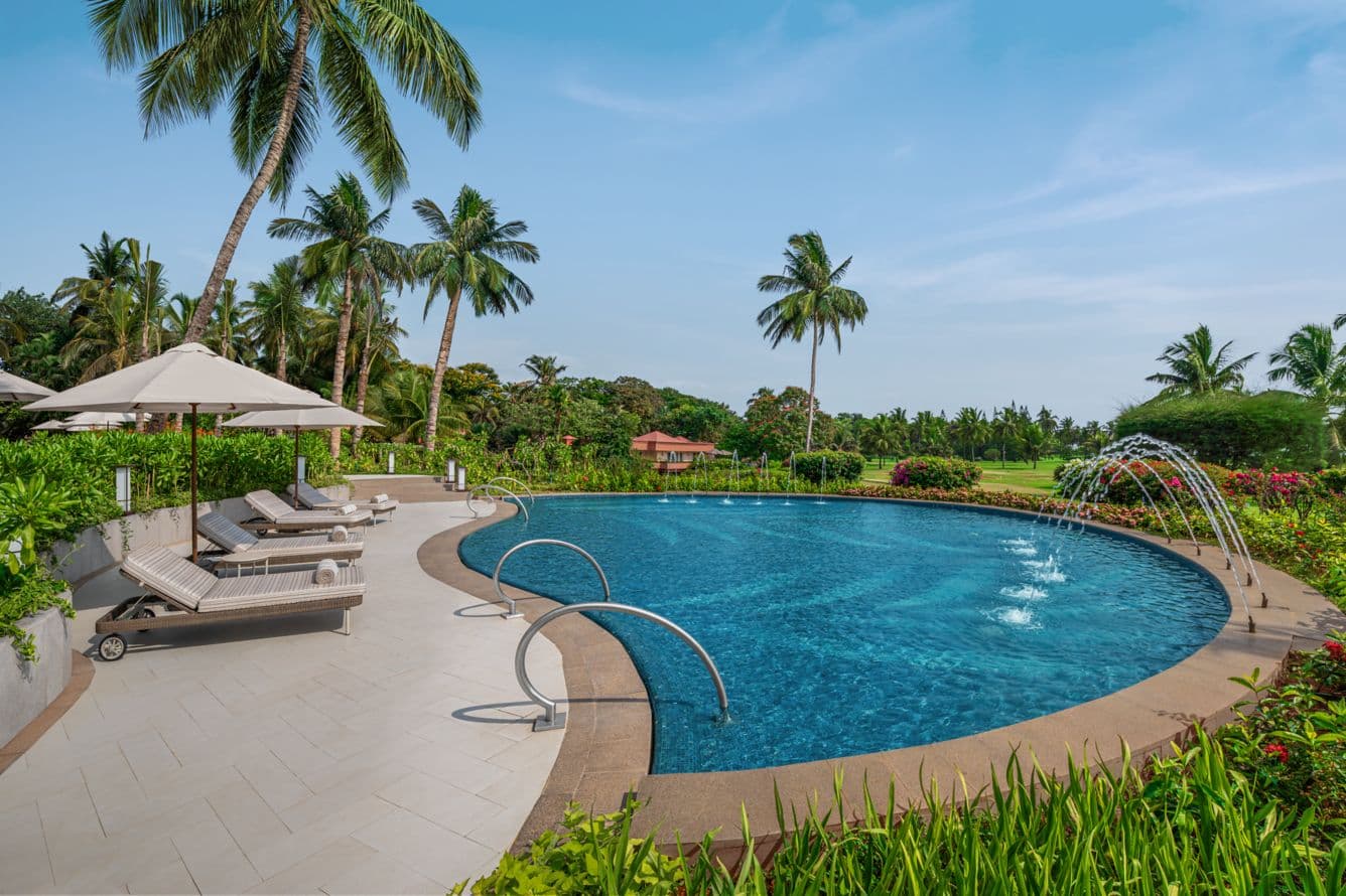 The children's pool at the St. Regis Goa, tiled in white and blue